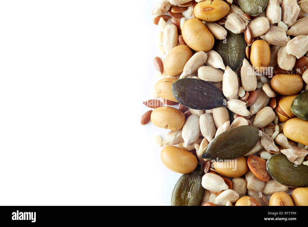 Mix of various healthy seeds including soy beans, sesame, pumpkin and ...