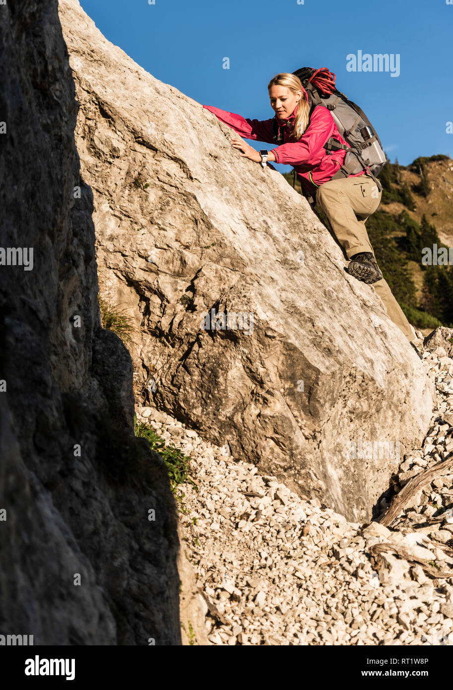 Hiking woman in rocky mountains hi-res stock photography and images - Alamy