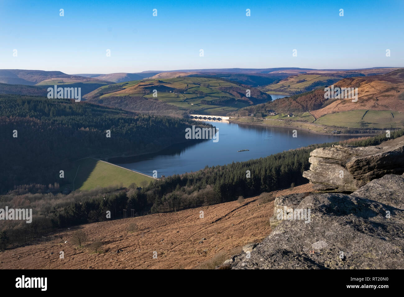 Peak district view from Bamford Edge looking over Derwent valley and Ladybower viaduct and reservoir, dam and valley Stock Photo