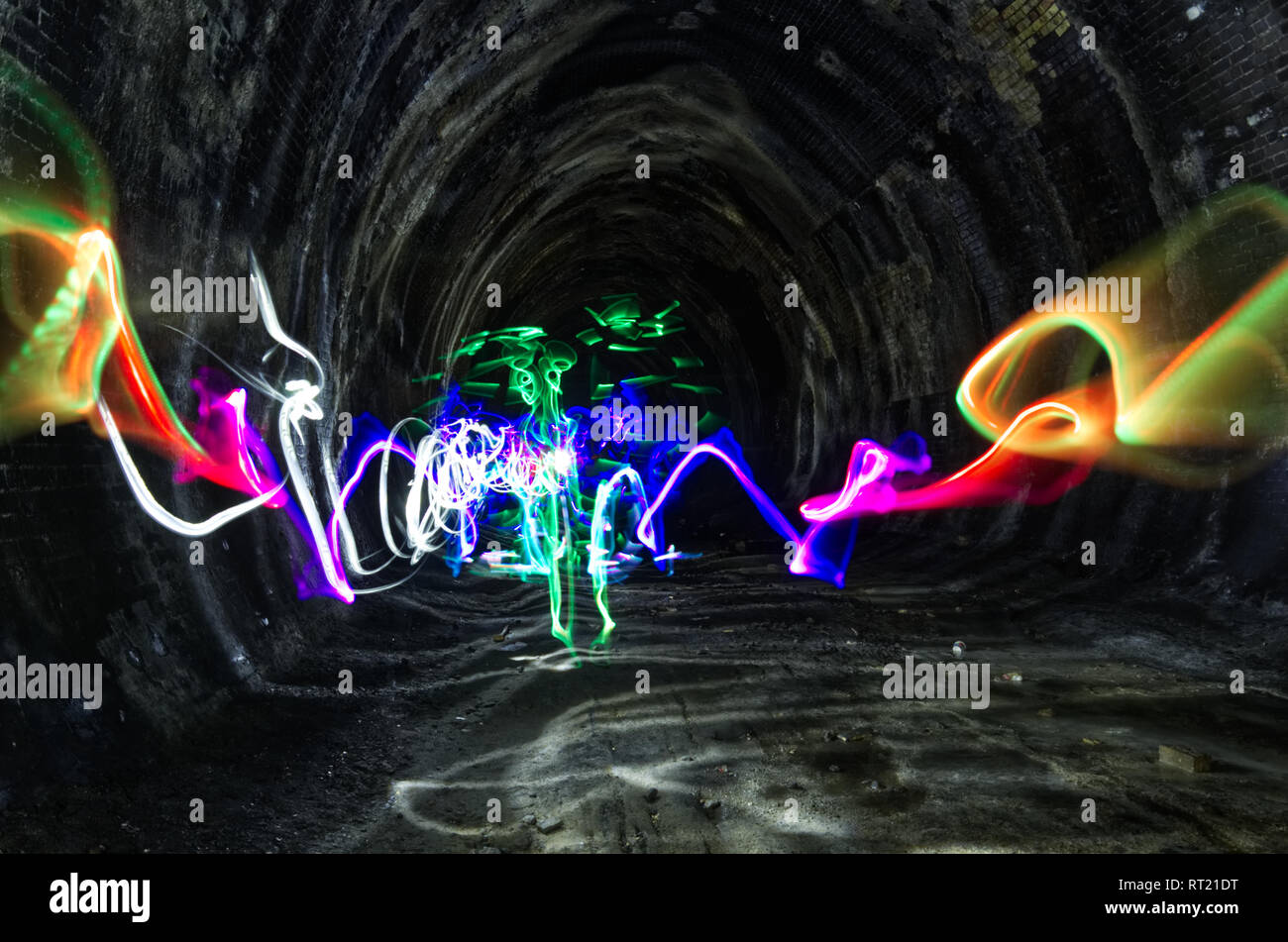 Abstract Light Painting Art created down a disused railway tunnel in England. Lovely Textures. Stock Photo