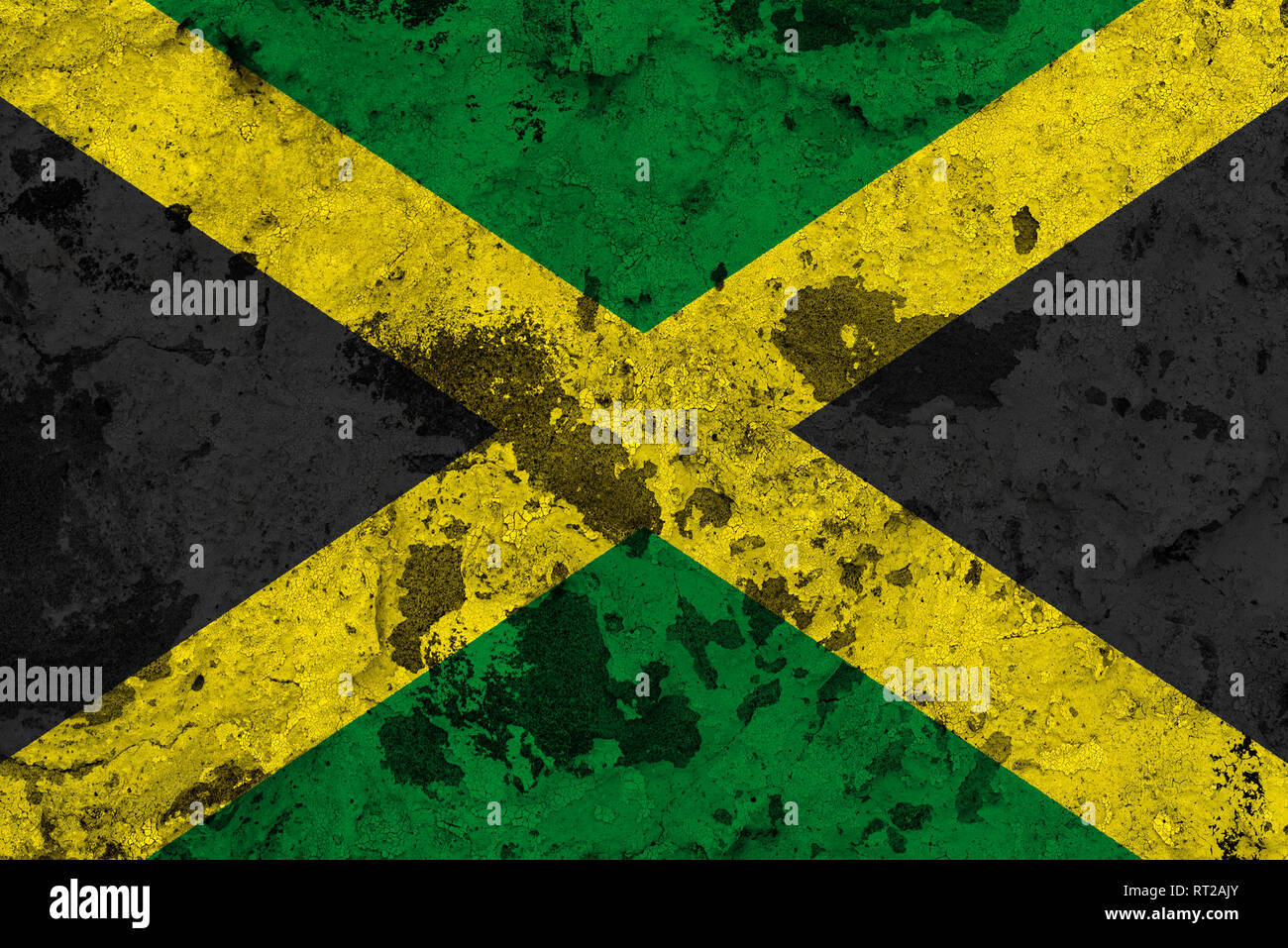 Jamaica flag on old wall. Patriotic grunge background. National flag of