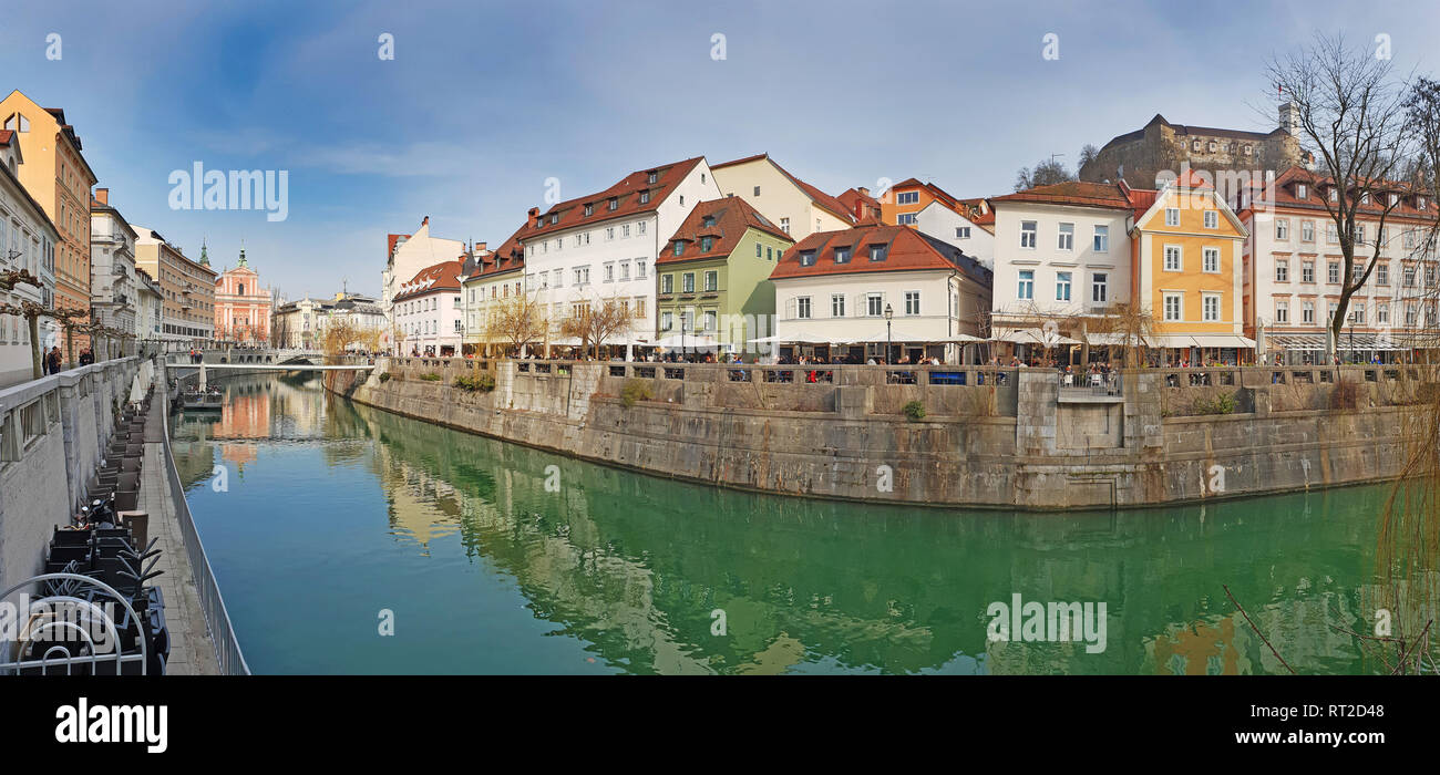 Panoramic view on Ljubljanica river canal in Ljubljana old town. Ljubljana is the capital of Slovenia and famous tourist destination in Slovenia Stock Photo