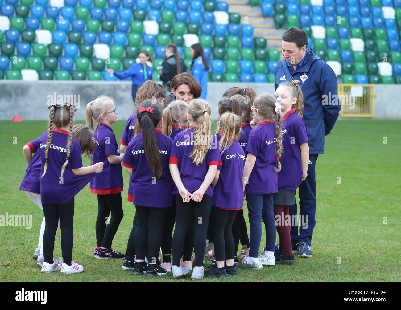 The Duchess of Cambridge takes part in a coaching session during hers and the Duke of Cambridge's visit to Windsor Park, Belfast as part of their two day visit to Northern Ireland. Stock Photo
