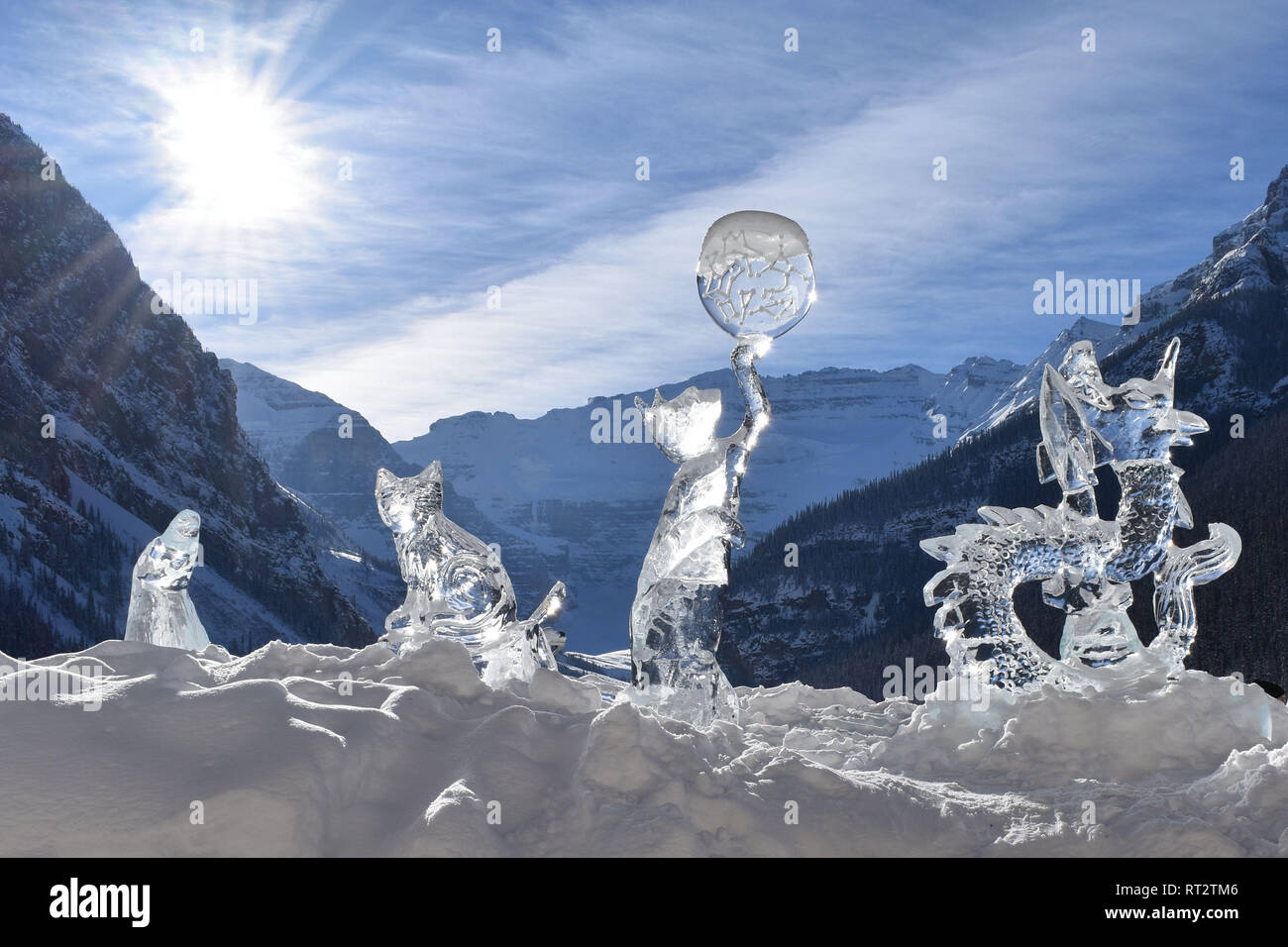 Sun over ice sculptures at Lake Louise in the Canadian Rockies Stock Photo  - Alamy