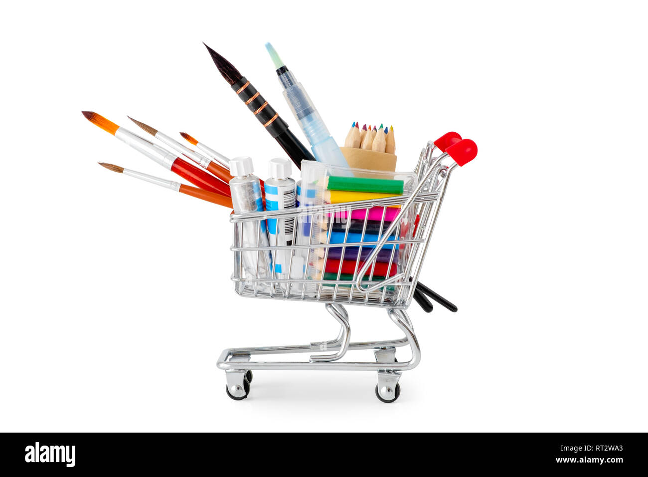 Mini shopping cart full with artistic goods for drawing on white background. Stock Photo