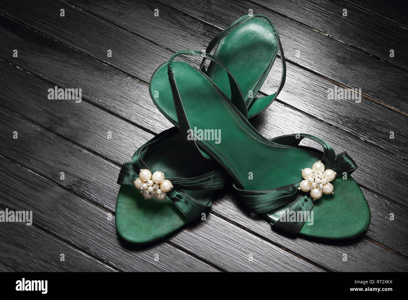 High Heels Sandals on Wooden Background Stock Photo
