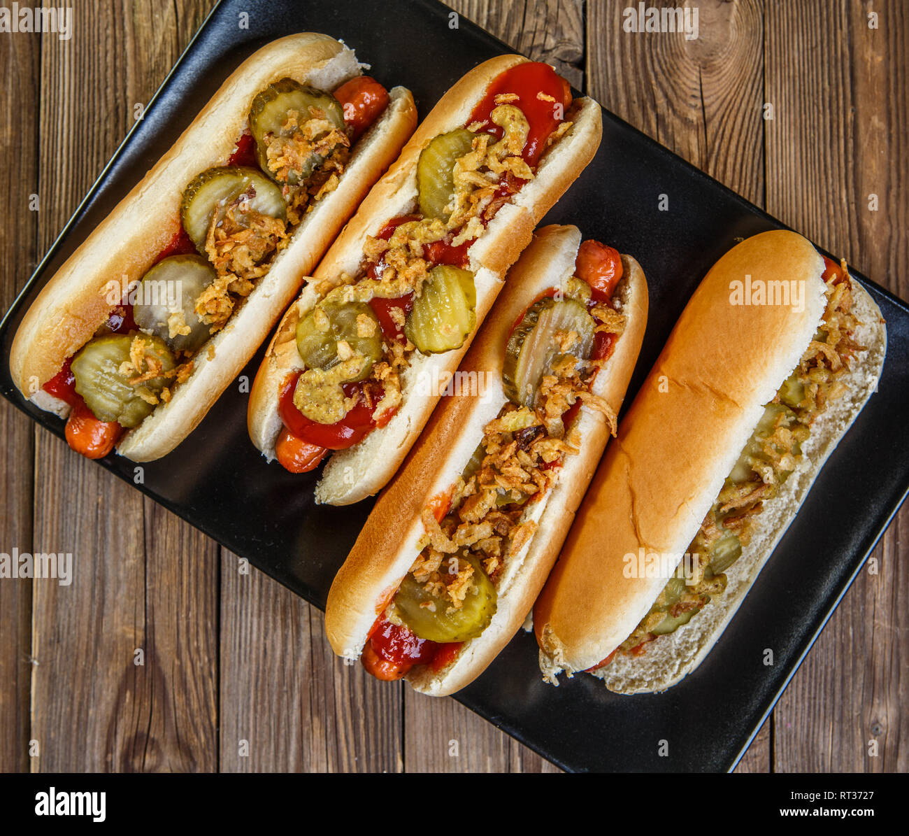 American hot dog with pickles,onions, ketchup and mustard Stock Photo