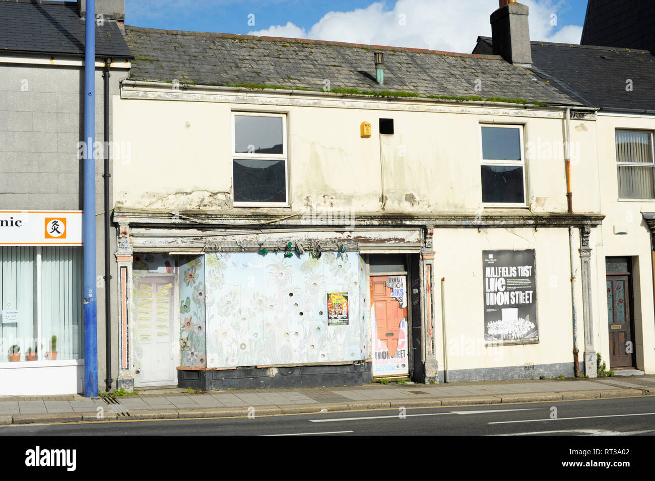 Closed and boarded up shops in Plymouth Devon England UK Stock Photo