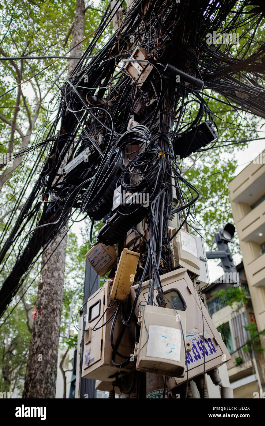 Electrical wires on a street pole in the city centre, Ho Chi Minh City