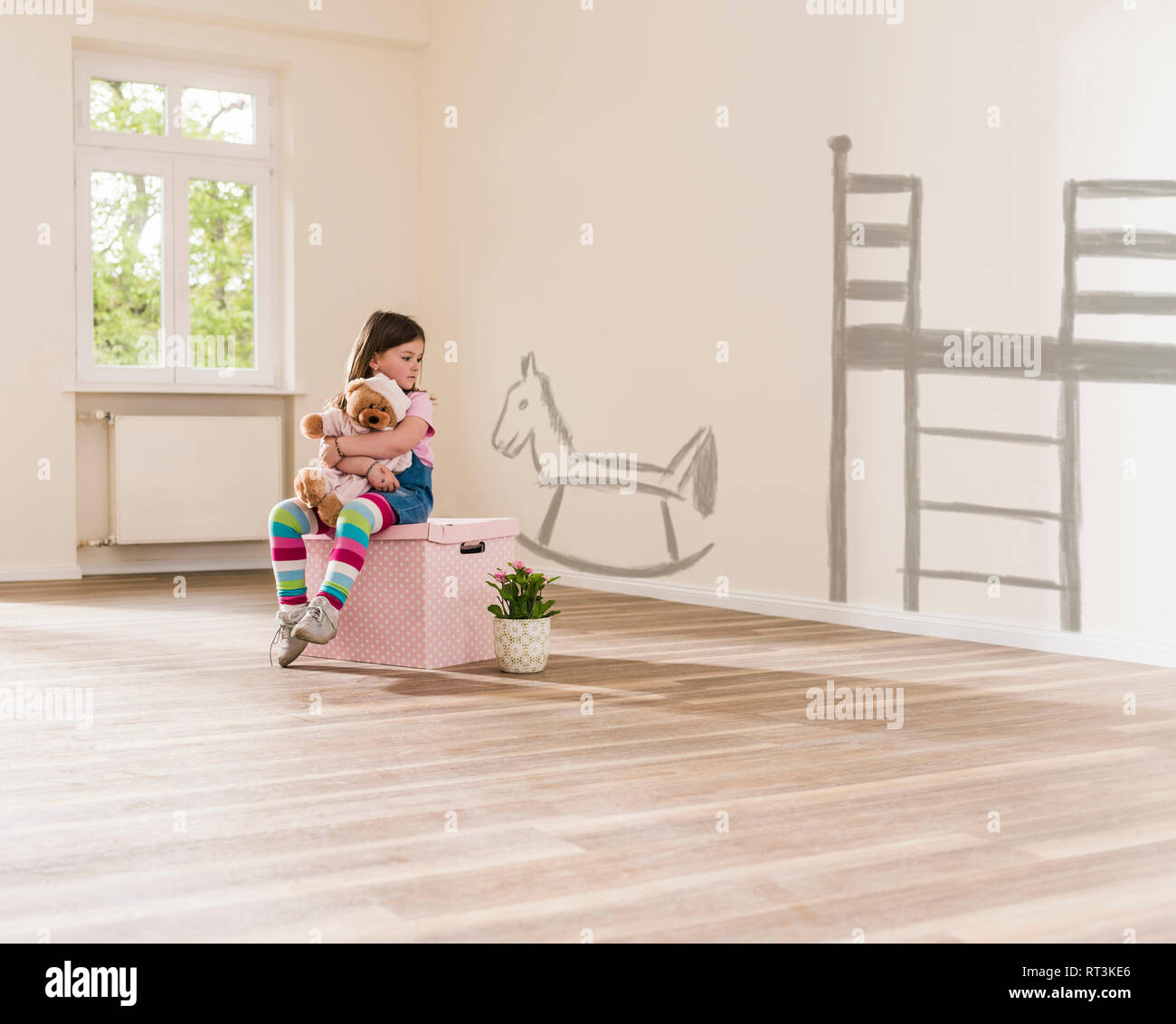 Girl sitting in empty room hi-res stock photography and images - Alamy