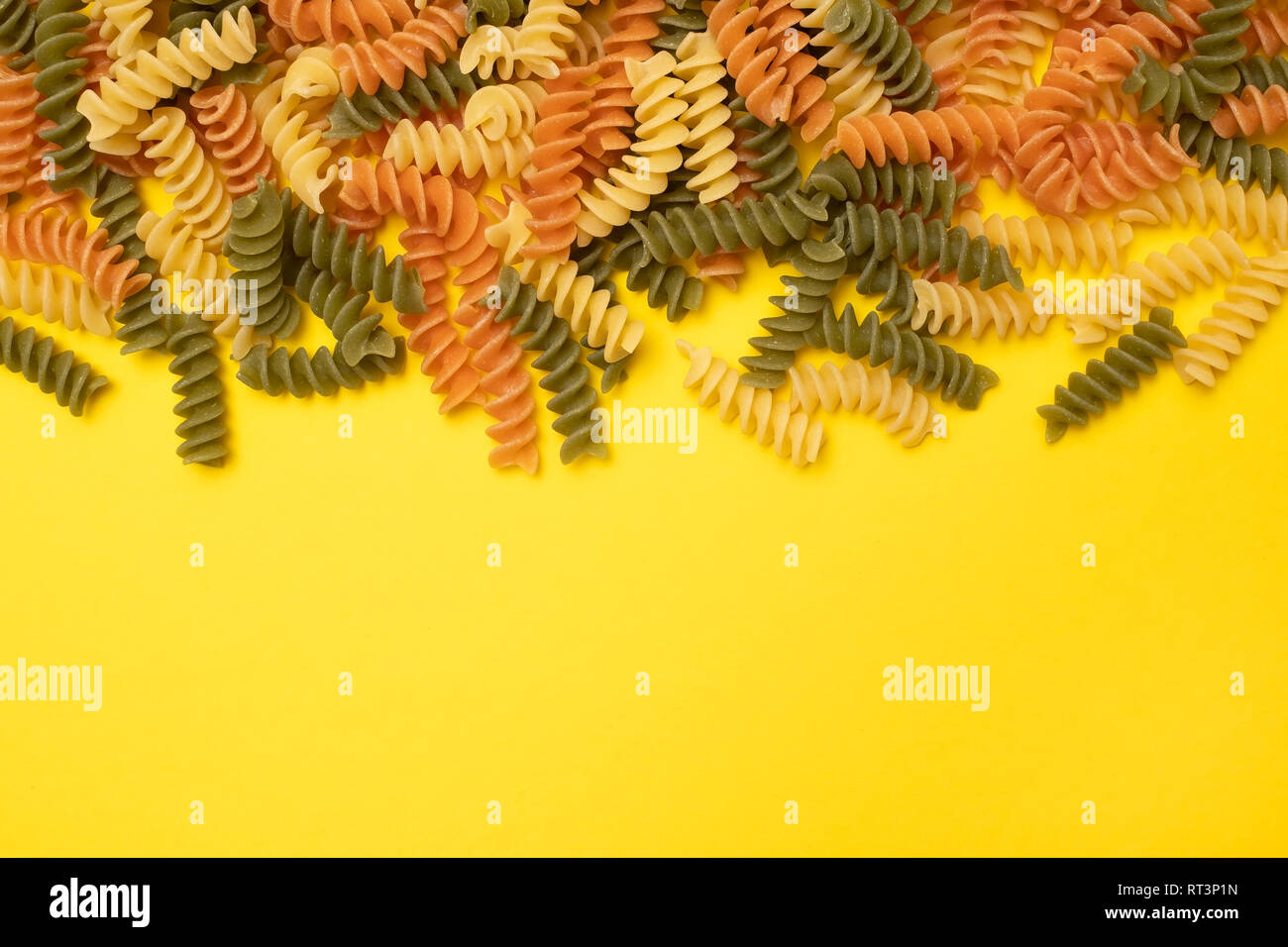 Download Fusilli Pasta On Yellow Background Top View Variety Of Macaroni Italian Food Stock Photo 238569681 Alamy PSD Mockup Templates