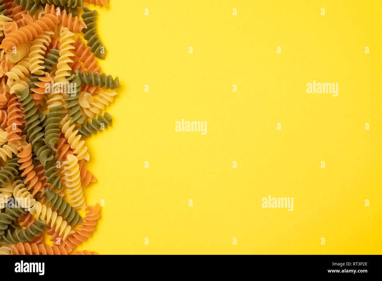 Download Fusilli Pasta On Yellow Background Top View Variety Of Macaroni Italian Food Stock Photo Alamy Yellowimages Mockups