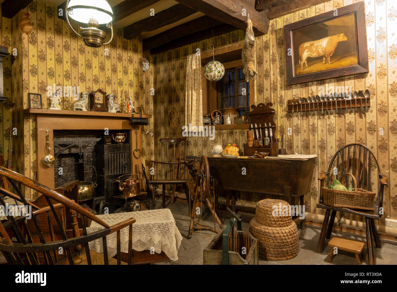 The Moorland Cottage display, showing the main family room in a rural farming area (mid-19th Century), York Castle Museum, York, Yorkshire, UK. Stock Photo