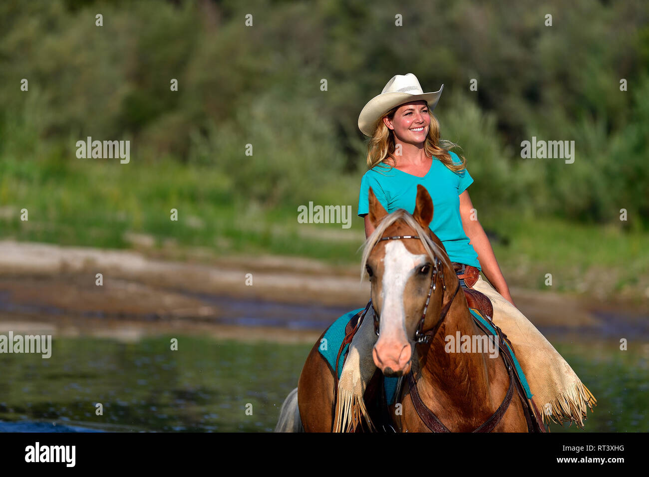 Lux and Kate riding on the Andie Ranch in Missoula Montana Stock Photo