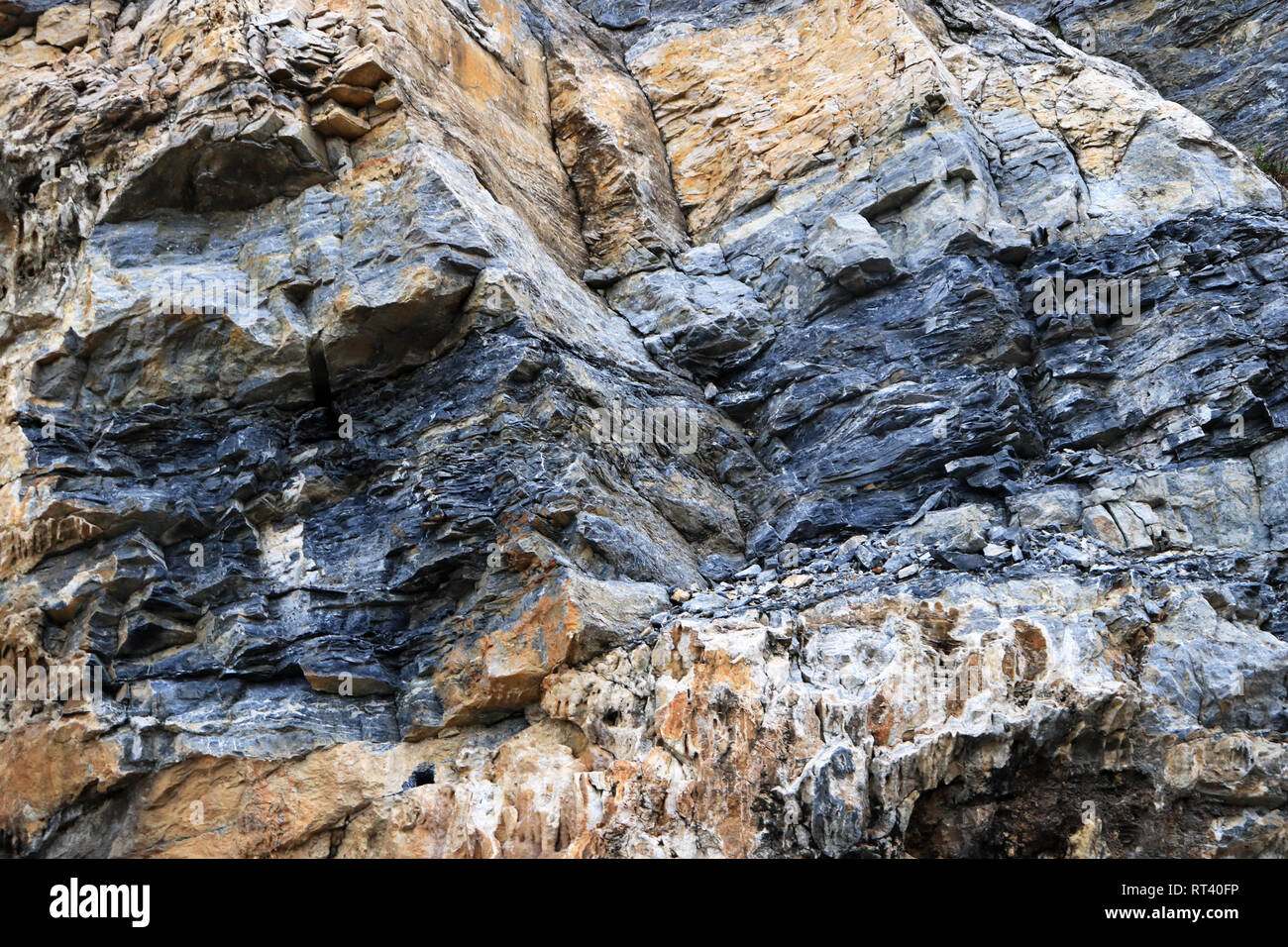 Laminate rock texture. Mountain pattern background. Stock Photo
