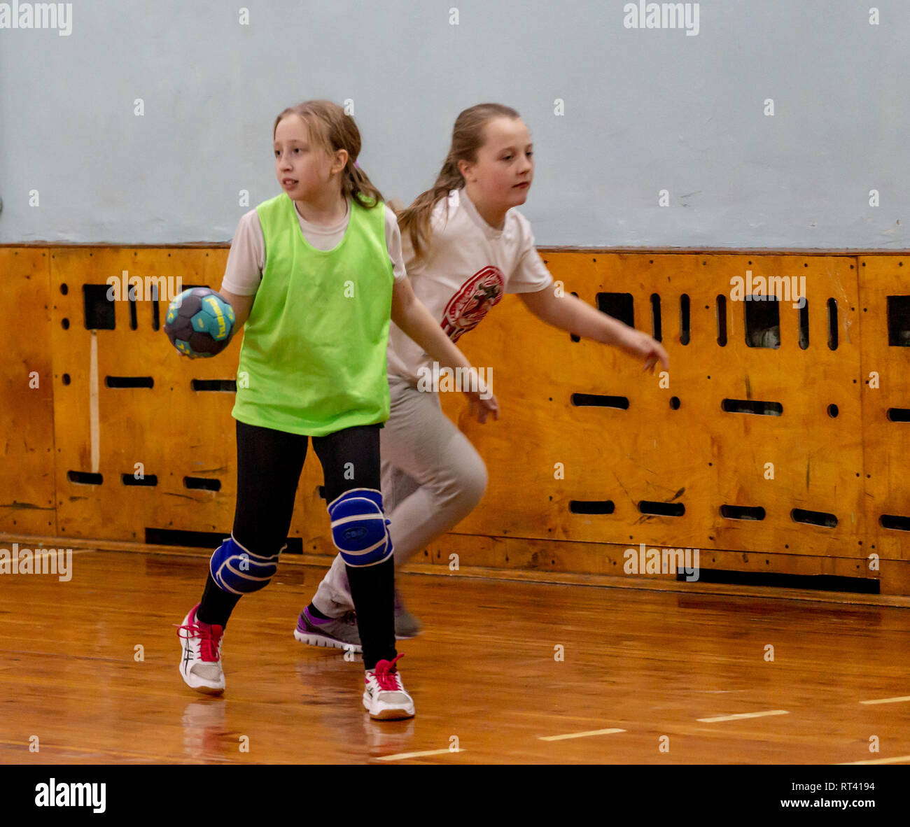 Russia, Vladivostok, 02/26/2019. Kids play handball indoor. Sports and