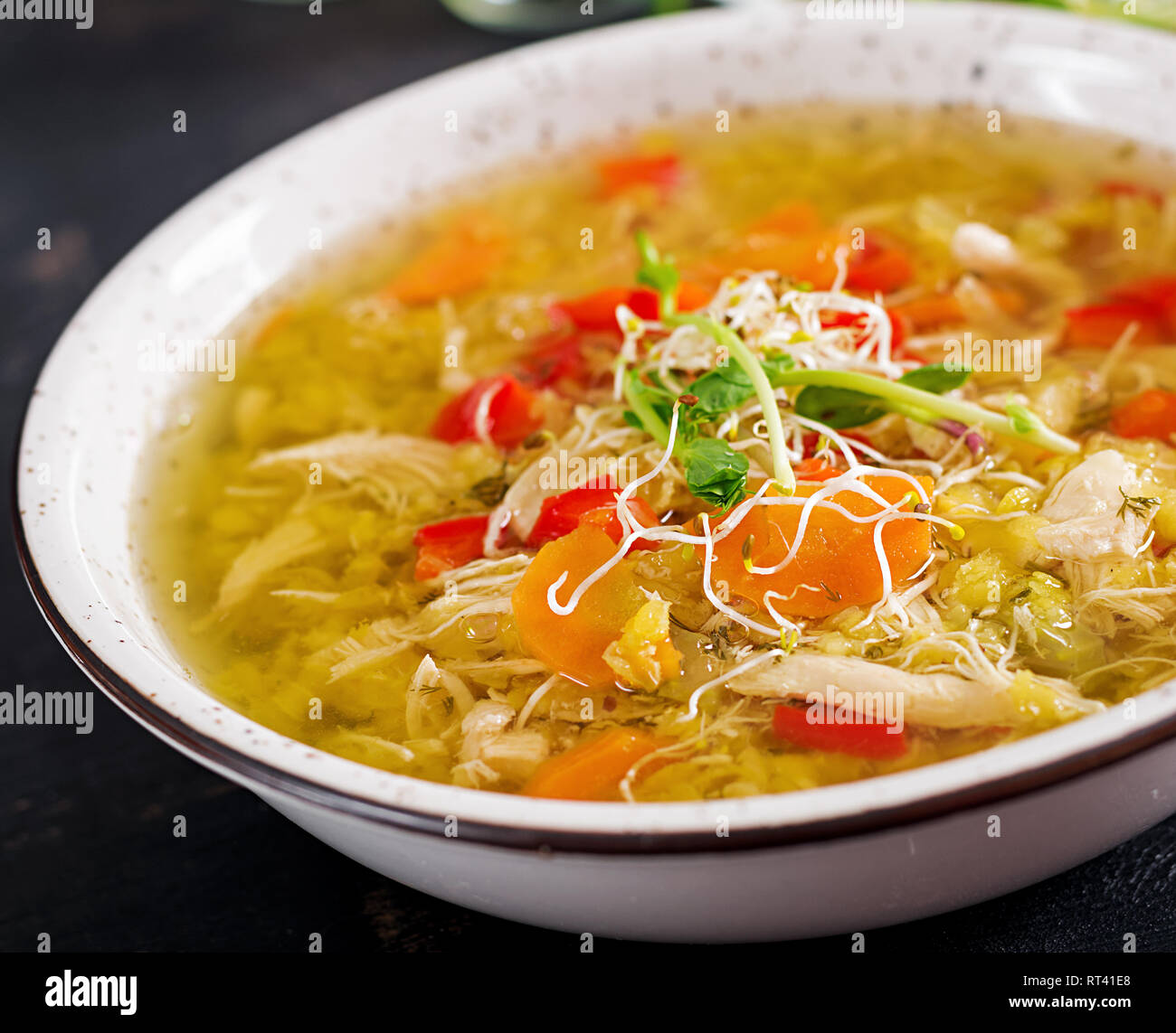 Soup with lentils, carrots, chicken meat, paprika, celery in a bowl Stock Photo Alamy