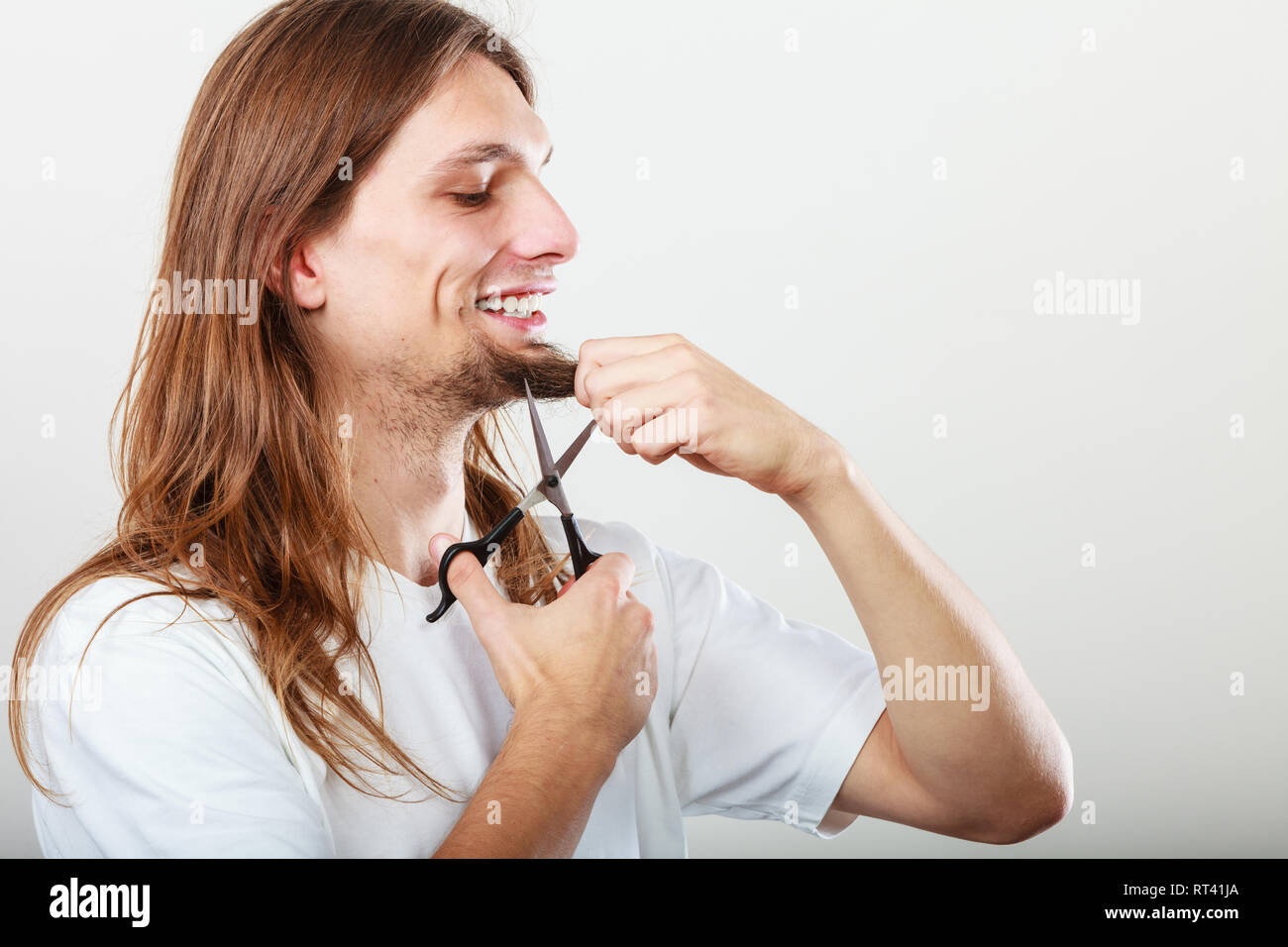 Cut And Shave Concept Young Man With Long Beard Holding Scissors