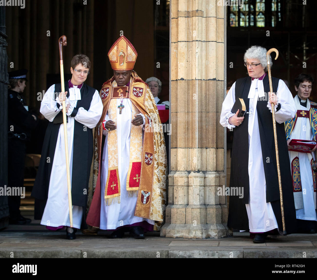 Dr Emma Gwyneth (left), Dr John Sentamu and Sarah Elizabeth following a double consecration of the The Reverend Dr Emma Gwyneth as the Suffragan Bishop of Penrith in the Diocese of Carlisle and The Venerable Sarah Elizabeth Clark as the Suffragan Bishop of Jarrow in the Diocese of Durham, during a ceremony at York Minster in Yorkshire. Stock Photo