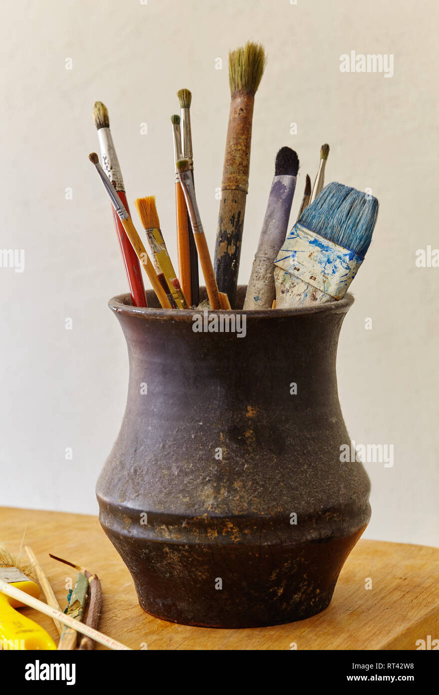 Photo of paint brushes in a jar Stock Photo Alamy