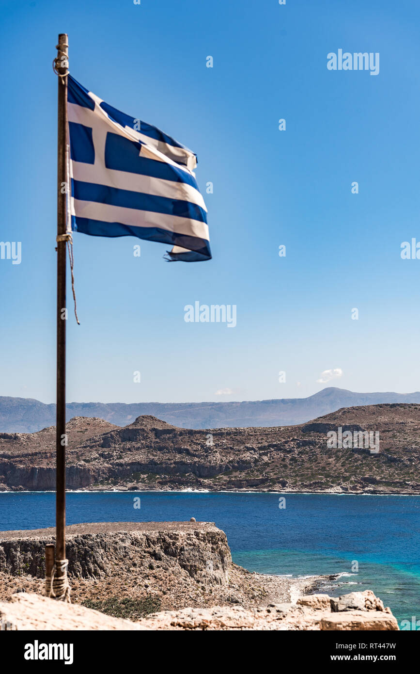 View from the fortress Gramvousa with greek flag Stock Photo