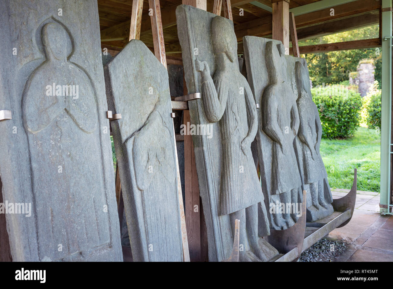 Carved effigies dating from the 1300's on display at Saddell Abbey near Carradale on the Kintyre peninsula. Stock Photo
