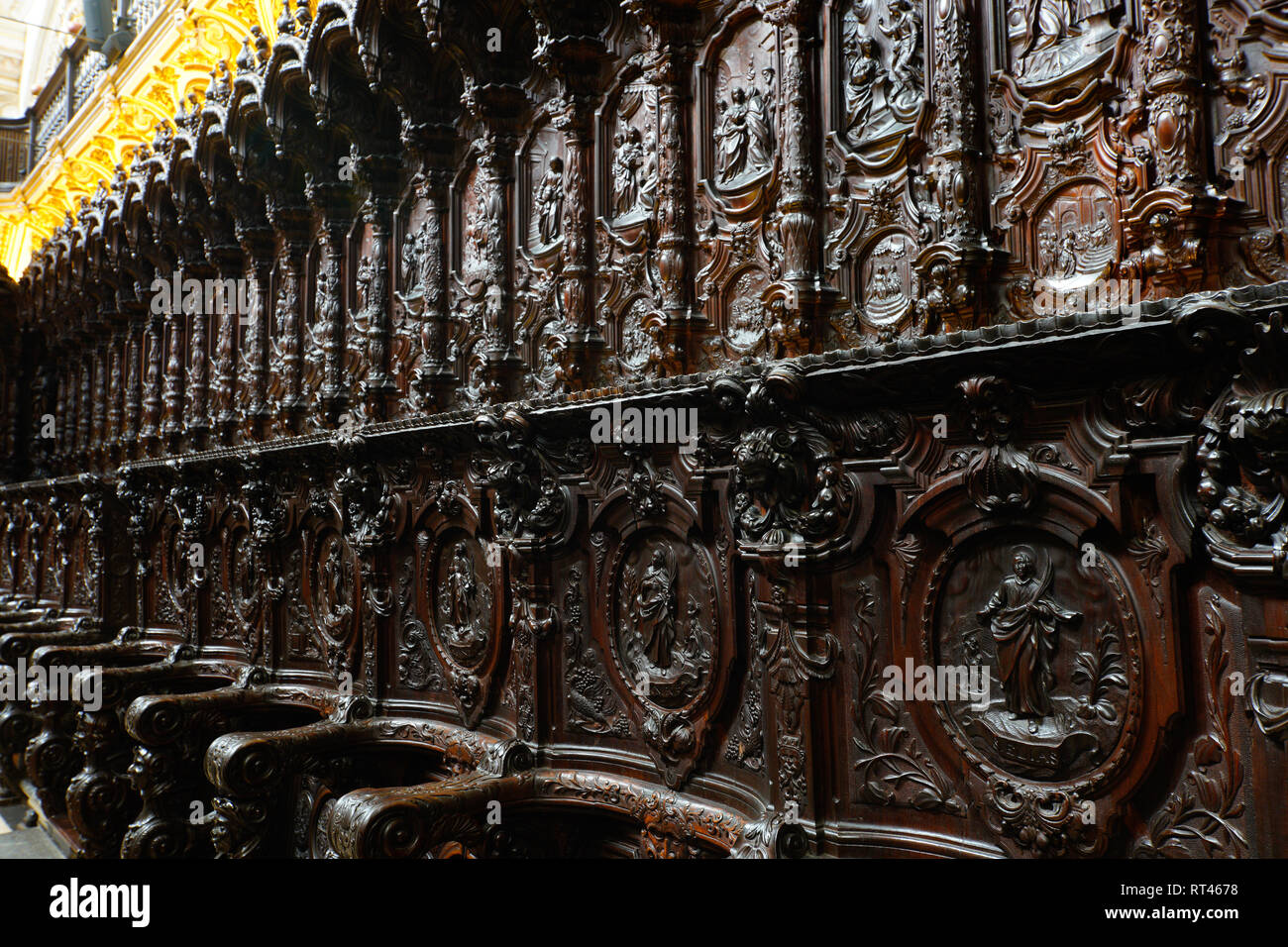 Impressive ornamented choir stalls in cathedral of Córdoba, Spain. Stock Photo