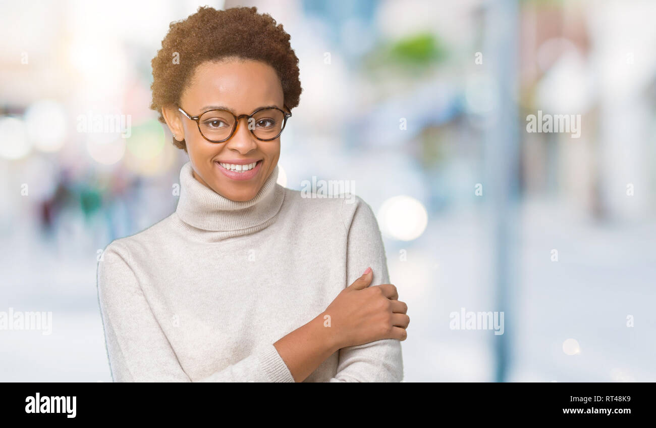 Young beautiful african american woman wearing glasses over isolated ...
