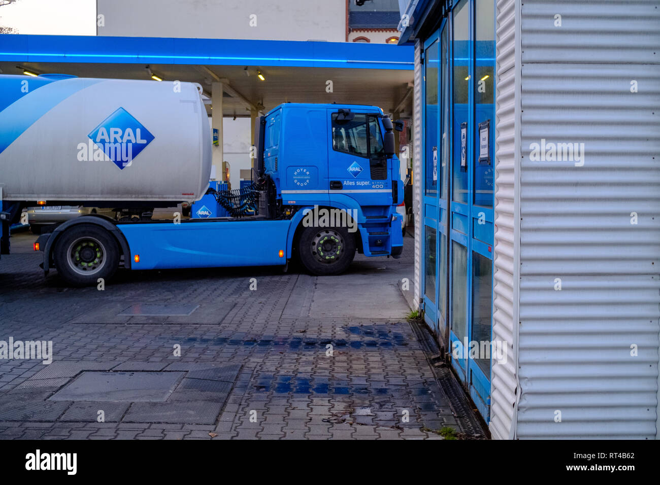 Branded tanker truck at an Aral gas station in Berlin, Germany, displays the brand's German slogan 'Alles super.'. Stock Photo
