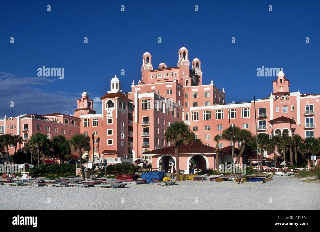 Appropriately called the Pink Palace, The Don Cesar is a splendid beach resort and spa that sprawls along a sandy shore of the Gulf of Mexico at St. Pete Beach on the west coast of  Florida, USA. Celebrities and other members of high society flocked to the landmark lodging in the Tampa Bay area when it opened in 1928 during the Sunshine State's early boom years. Beginning in 1942 the grand hotel was used as a hospital and convalescent center for wounded World War II soldiers before falling into disrepair. New owners in 1973 restored the towered nine-story hoitel to its former glory. Stock Photo