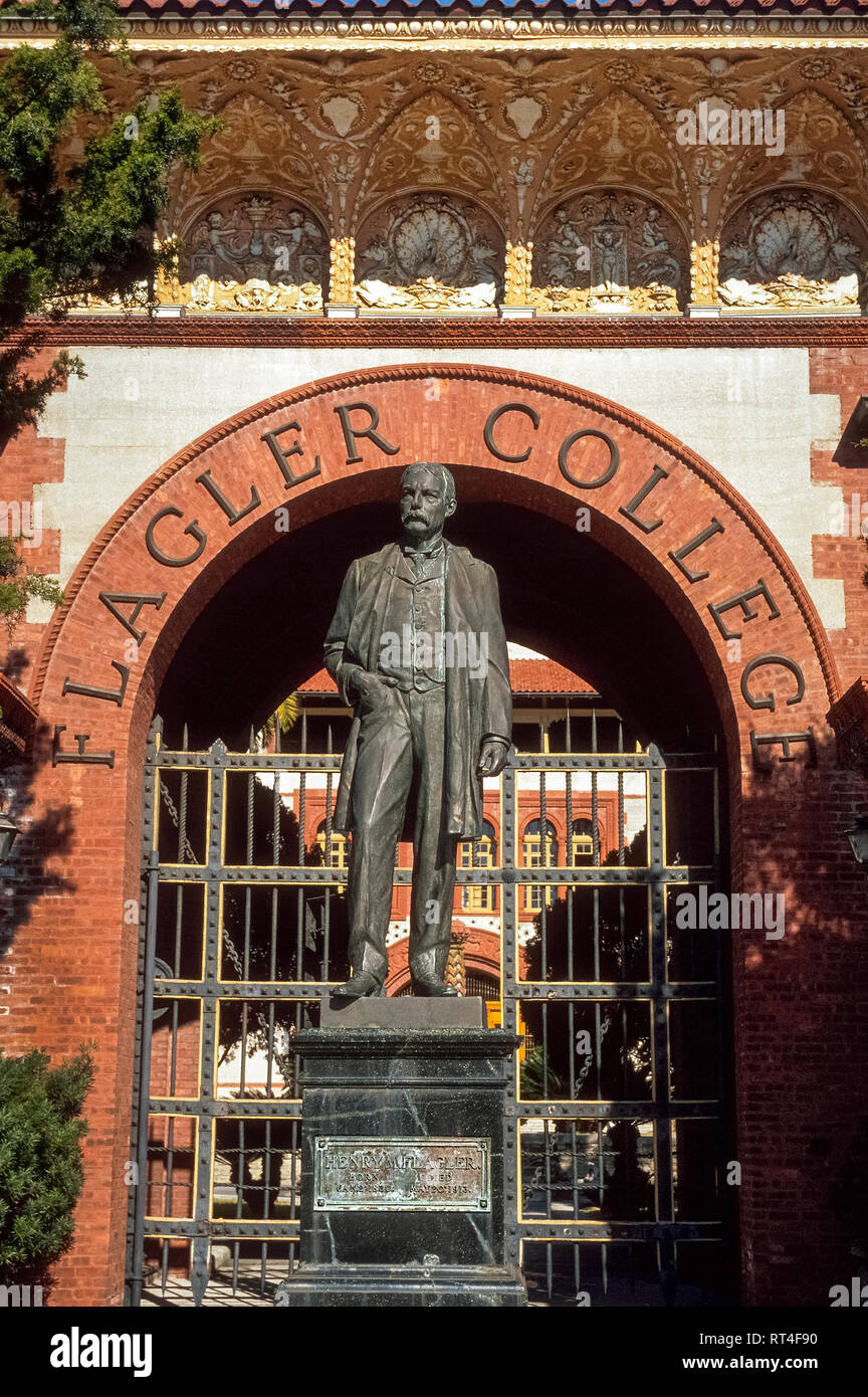 A bronze statue of American industrialist Henry M. Flagler (1830-1913) stands in front of his namesake Flagler College in St. Augustine, Florida, USA. Founded in 1968 in the heart of that city, the liberal arts school boasts an architectural attraction, the historic Ponce De Leon Hotel, which was built by Flager in 1885 as one of the first luxurious resorts along Florida's Atlantic Coast. After becoming wealthy as a founder of Standard Oil, he became known for developing early tourism in the Sunshine State by building more grand hotels and the Florida East Coast Railway. Stock Photo