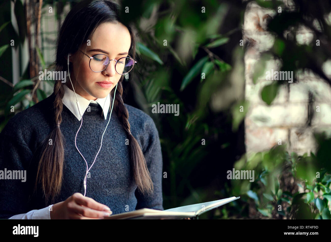 Woman wearing glasses braids hi-res stock photography and images - Alamy