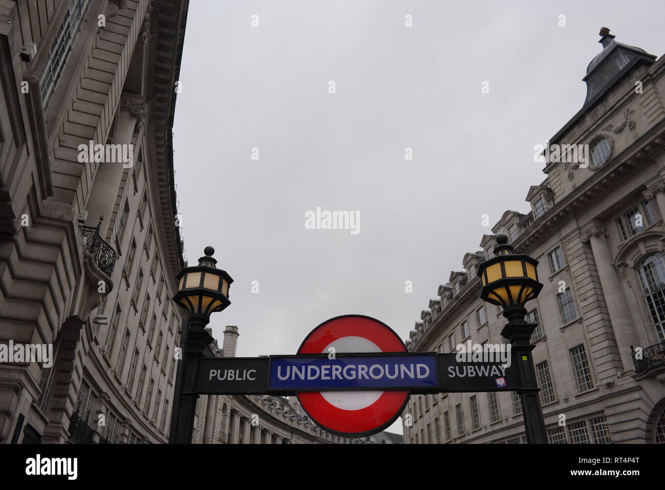 point of view of one of the underground train entrances in one of the most famous streets in London during the cloudy day during winter 2019 Stock Photo