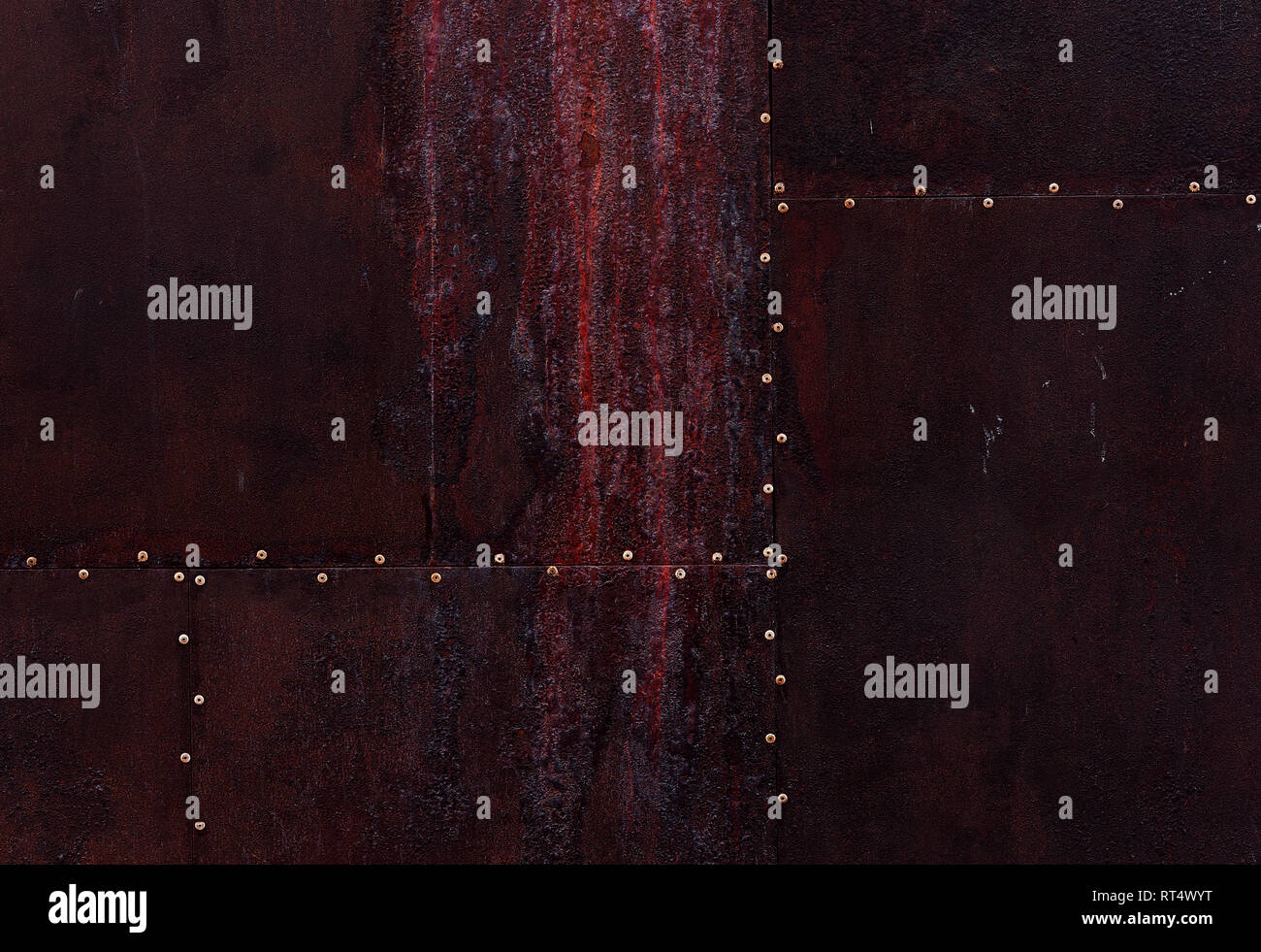 Close up dark burgundy texture color metal background with small rivets