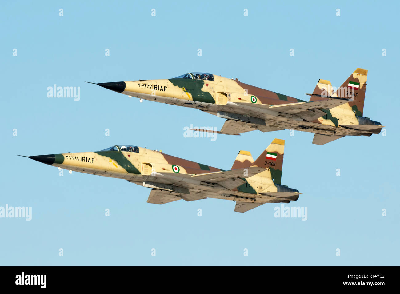 A pair of Islamic Republic of Iran Air Force HESA Saegheh I aircraft in flight. Stock Photo