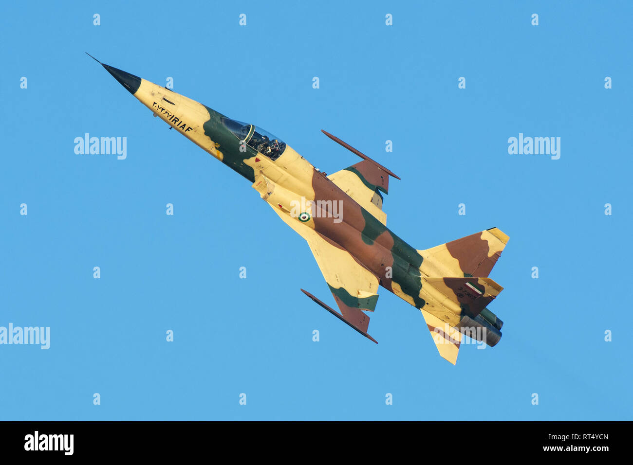 An Islamic Republic of Iran Air Force HESA Saegheh I aircraft in flight. Stock Photo