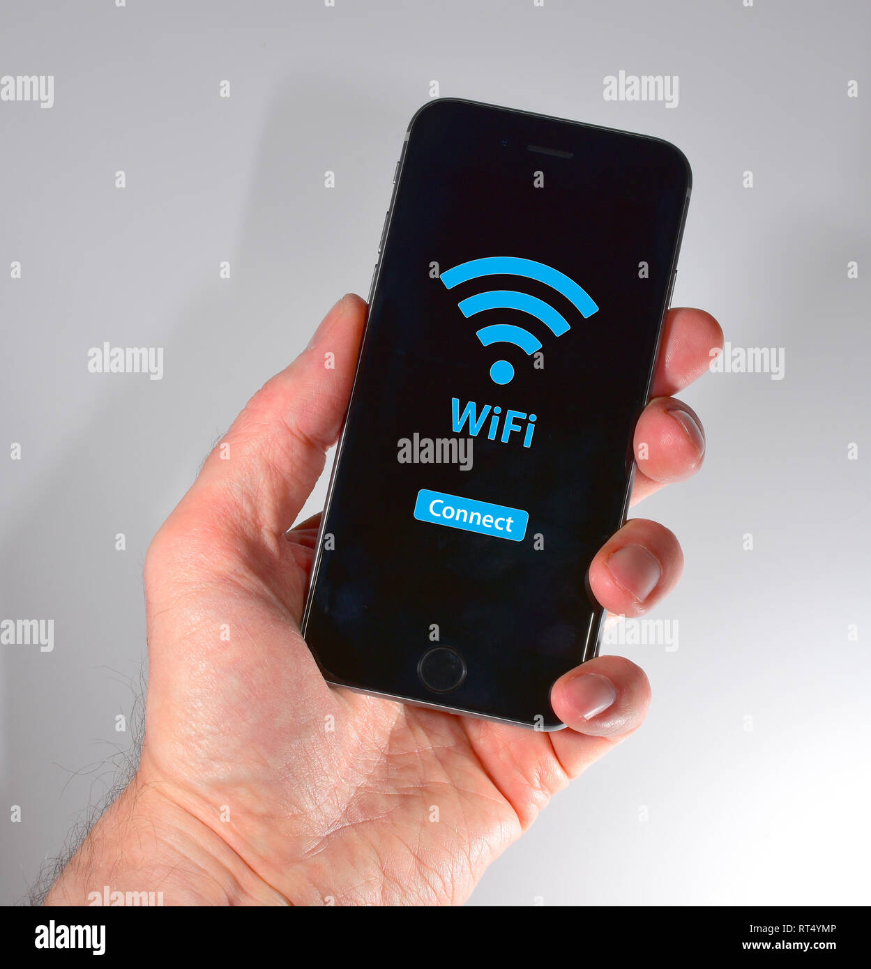 Iphone Held In Hand Wifi Symbol Stock Photo Alamy