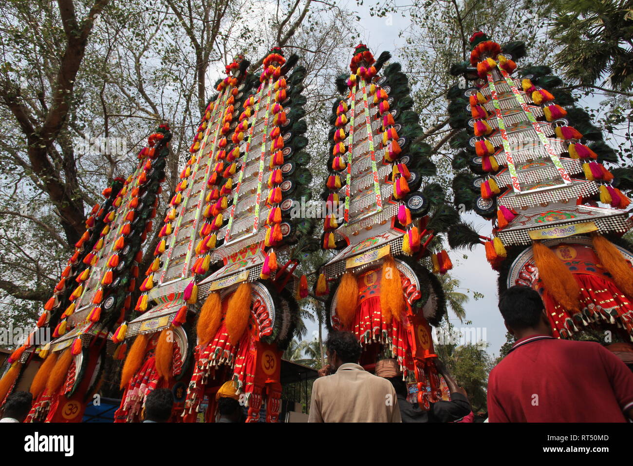 kaavadiyattam or burden dance is ceremonial sacrifice of devotees during worship of hindu lord murugan. Stock Photo