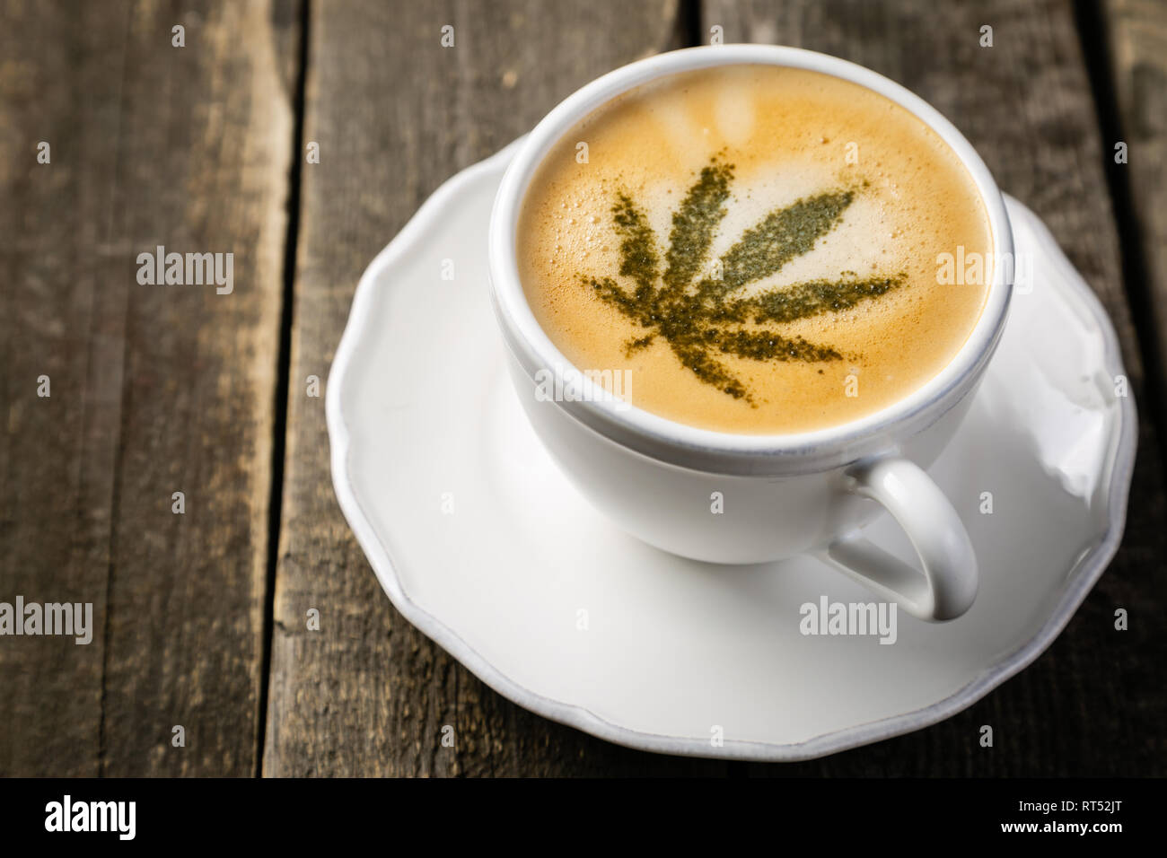 Cannabis coffee marijuana leaf on coffee foam Stock Photo Alamy