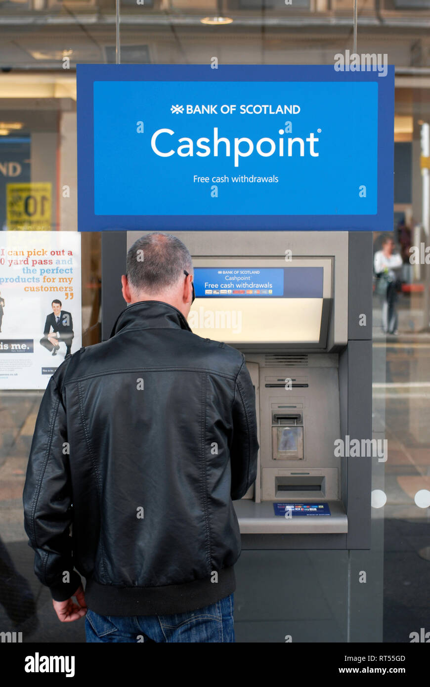Man at ATM Bank of Scotland at Argyle Street, "St. Enoch", Glasgow
