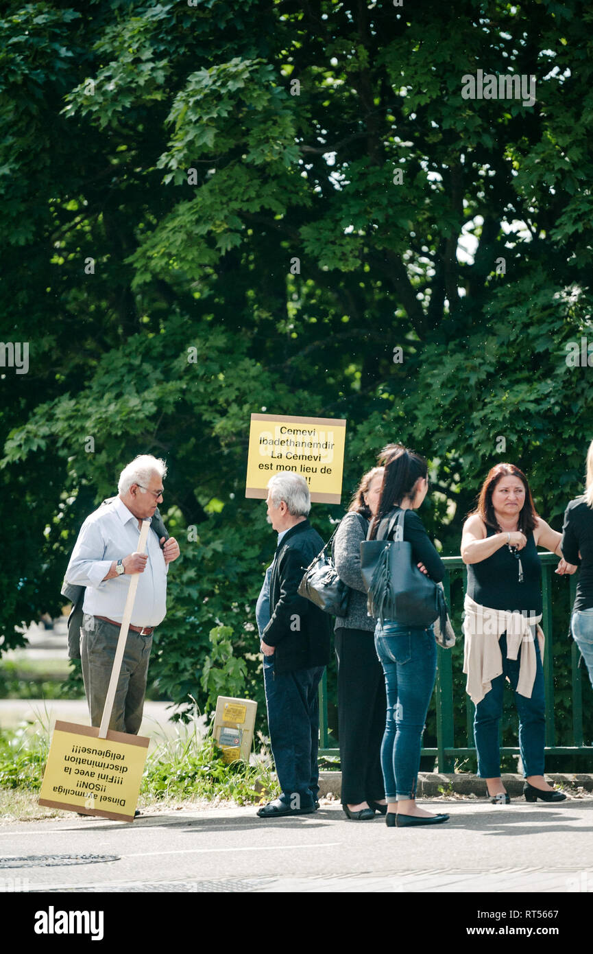 STRASBOURG, FRANCE - JUN 3, 2015: People protesting at European Court of Human Rights ECHR during grand chamber hearing conc rejection made by Turkish Alevis that state cover the expenses of cemevis Stock Photo