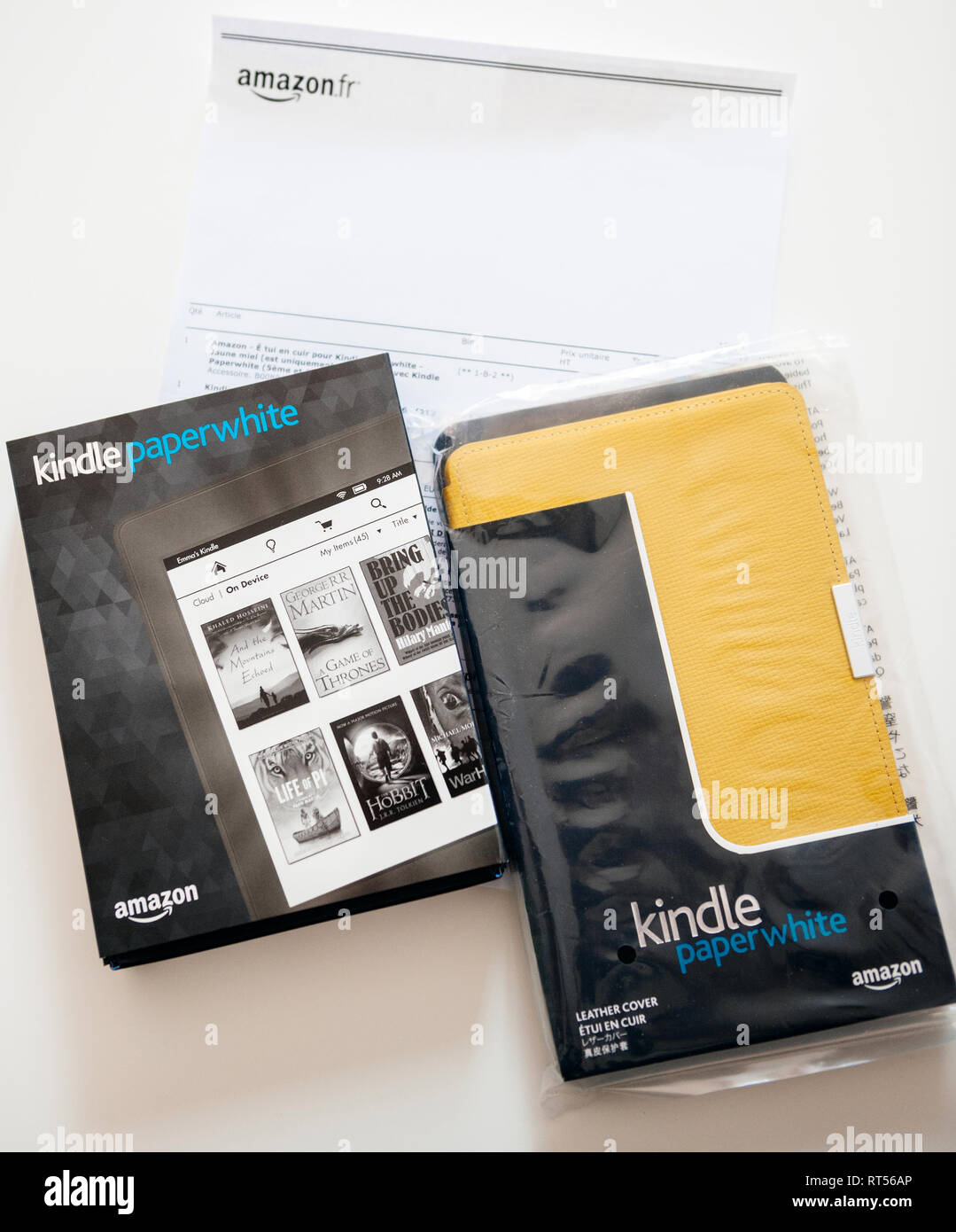 Paris France May 16 New Amazon Kindle Paperweight E Reader Electronic Device And Its Leather Cover On The White Invoice Paper Featuring The Price Stock Photo Alamy Paris France May 16 New Amazon Kindle Paperweight E Reader Electronic Device And Its Leather Cover On The White Invoice Paper Featuring The Price Stock Photo Alamy