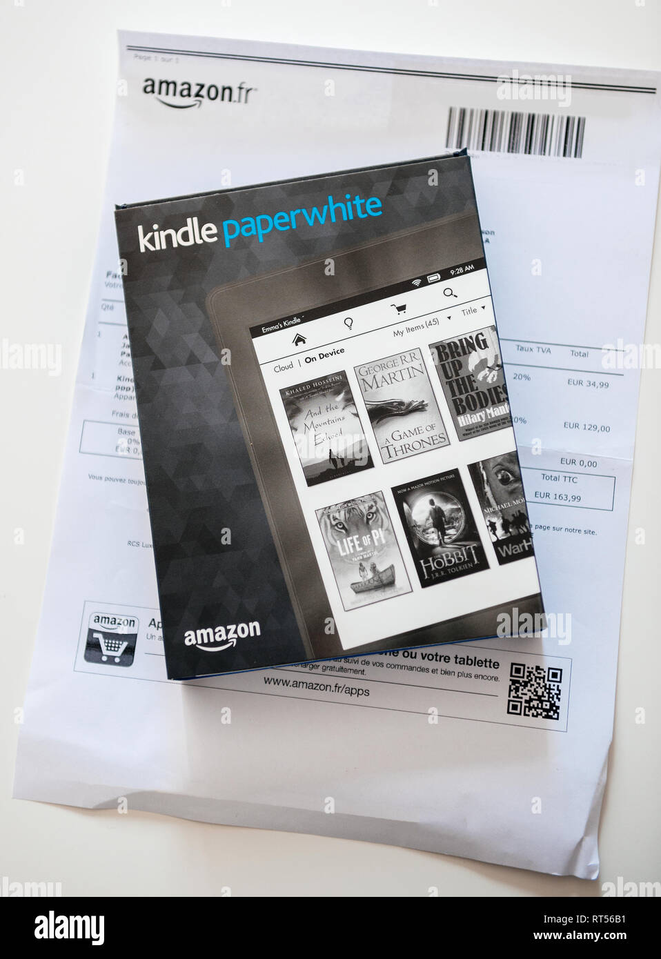 Paris France May 16 New Amazon Kindle Paperweight E Reader Electronic Device And Its Leather Cover On The White Invoice Paper Featuring The Price Stock Photo Alamy Paris France May 16 New Amazon Kindle Paperweight E Reader Electronic Device And Its Leather Cover On The White Invoice Paper Featuring The Price Stock Photo Alamy