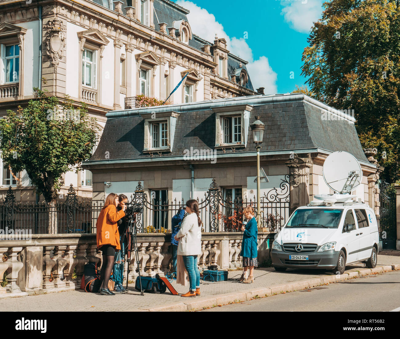STRASBOURG, FRANCE - OCT 3, 2017: France 3 alsace reporters preparing to transmit live from the street of Strasbourg near the residence of Secretary General of the Council of Europe Stock Photo