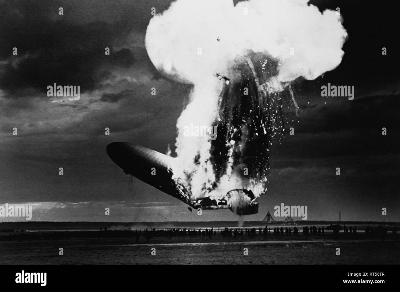 The explosion of the airship Hindenburg upon docking at Lakehurst, New Jersey on May 6, 1937. Stock Photo