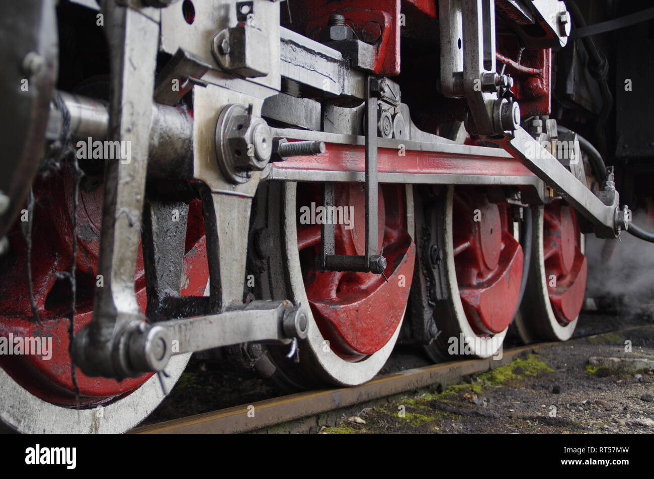 Steam locomotive wheels. Close view of retro train gear. Stock Photo
