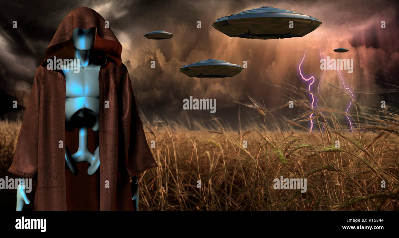 Robot in robe in the field of wheat. Alien's spacecrafts in the sky above. Stock Photo