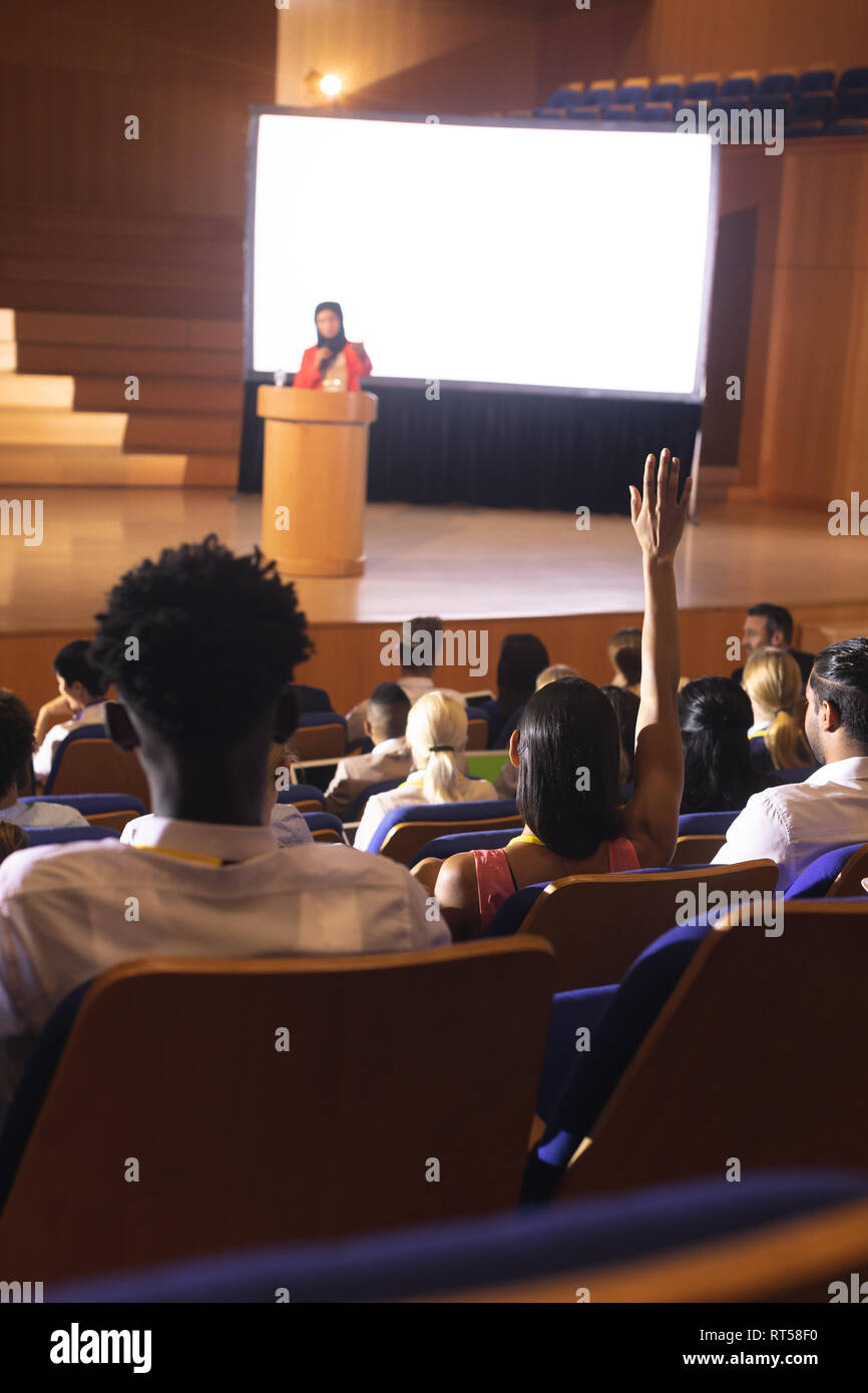 People Rasing Their Hand For Questions Woman in the audience speaker hi-res stock photography and images - Alamy