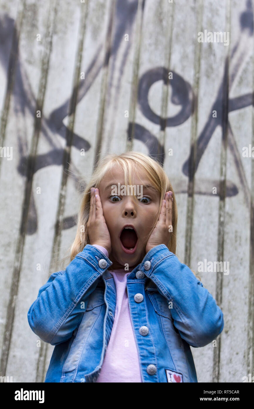 Portrait of scared blond girl Stock Photo