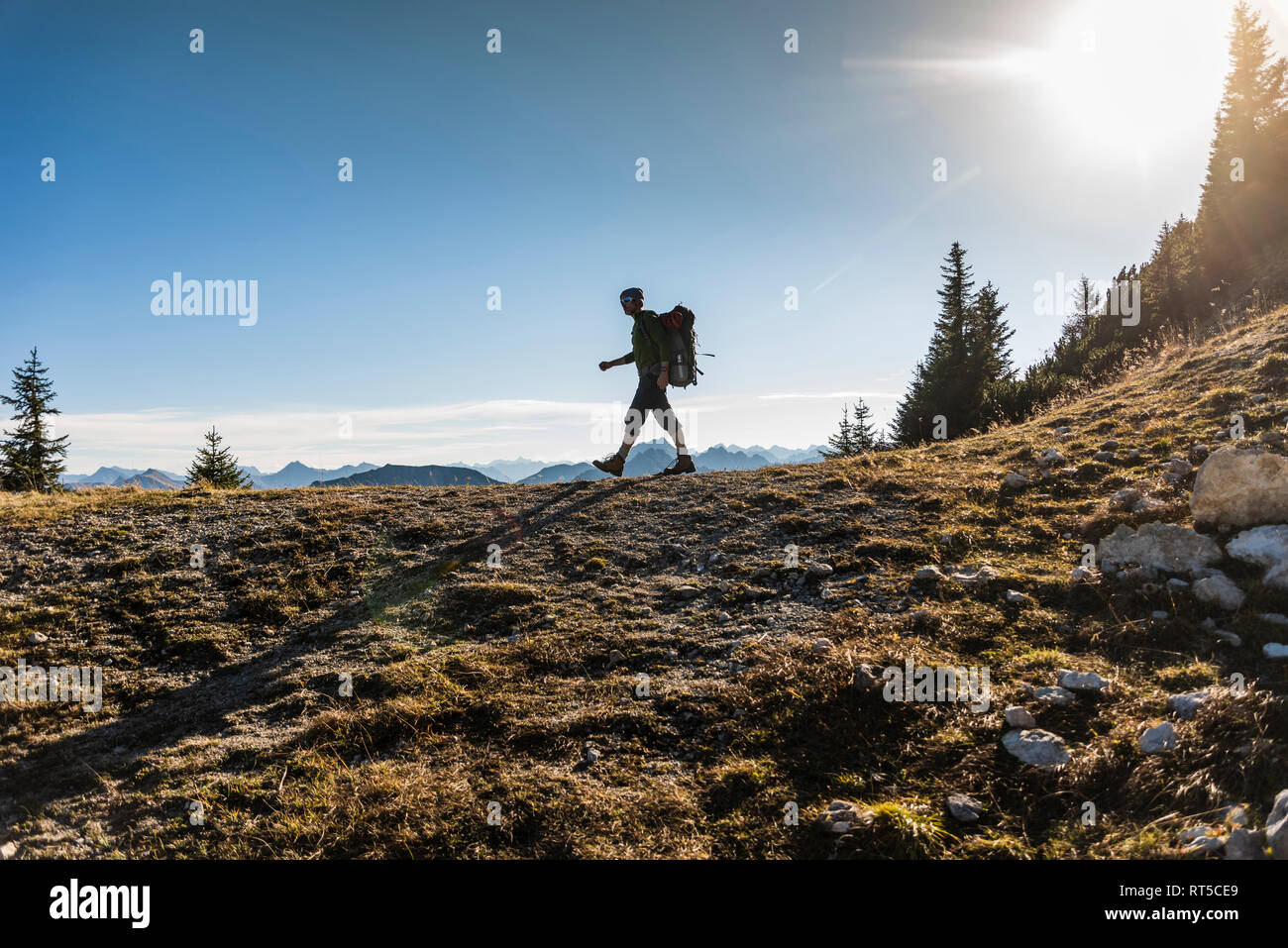 Mature man hiking in the mountains Stock Photo